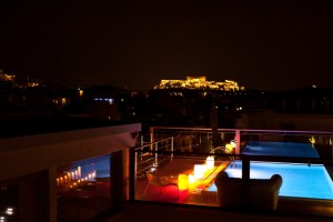 couch, pool and Acropolis landscape